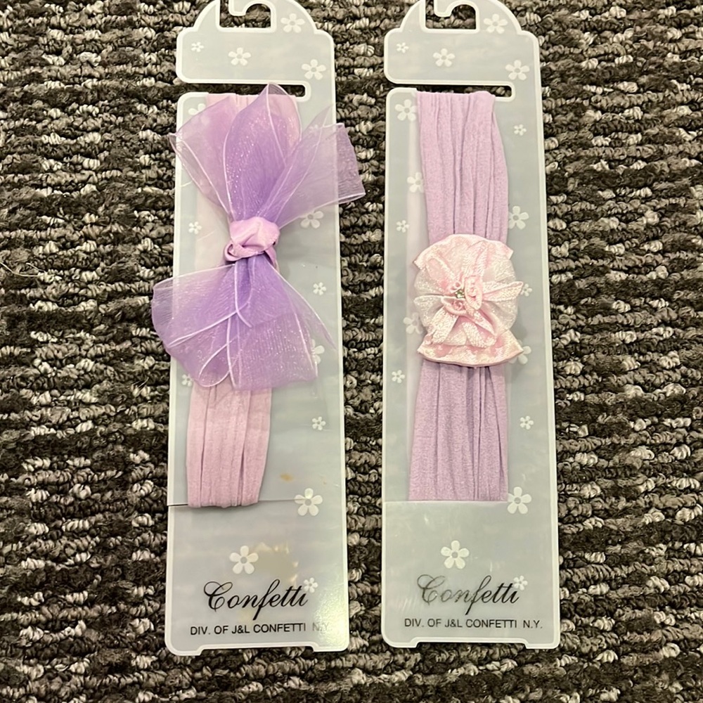 2 purple baby headbands